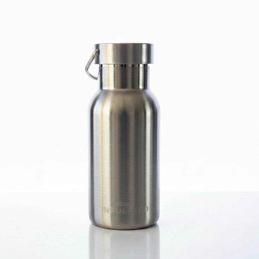 Close-up of the 7cm diameter 350ml insulated bottle showing capacity etching.

