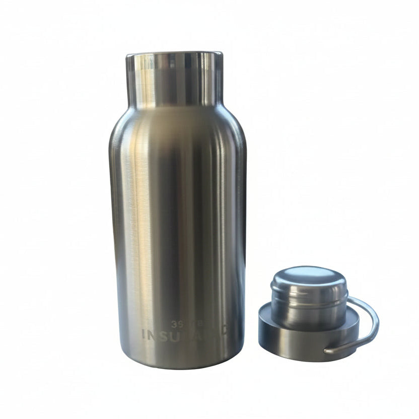 Stainless steel water bottle with lid off, highlighting its compact 17cm size and vacuum insulated interior.