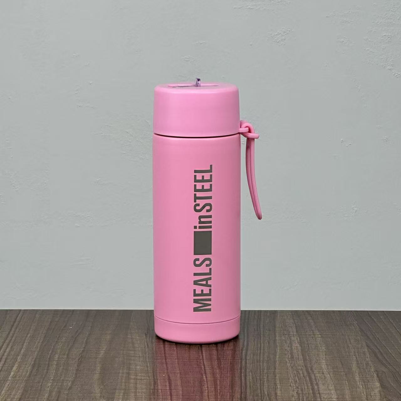 650ml insulated stainless steel water bottle with straw lid and carry handle in pink
